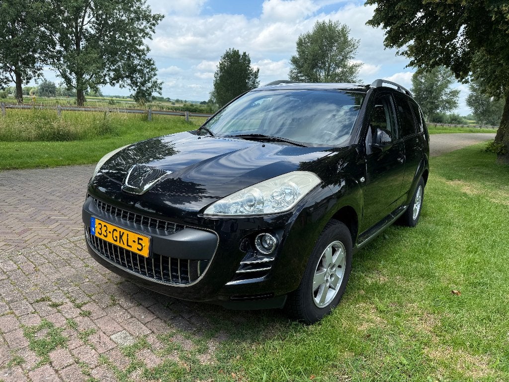 Peugeot 4007 2.4 16V 4WD 7P 2008 Zwart, Auto's, 4 cilinders, 7 stoelen, Zwart, Handgeschakeld