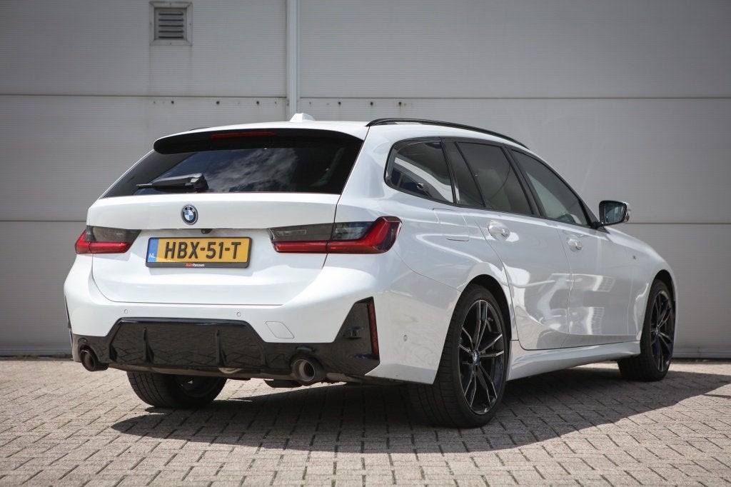 BMW 3 Serie Touring 330e xDrive | M Sport | M3 stoelen | Pan, Auto's, 1998 cc, Gebruikt, Euro 6, Wit