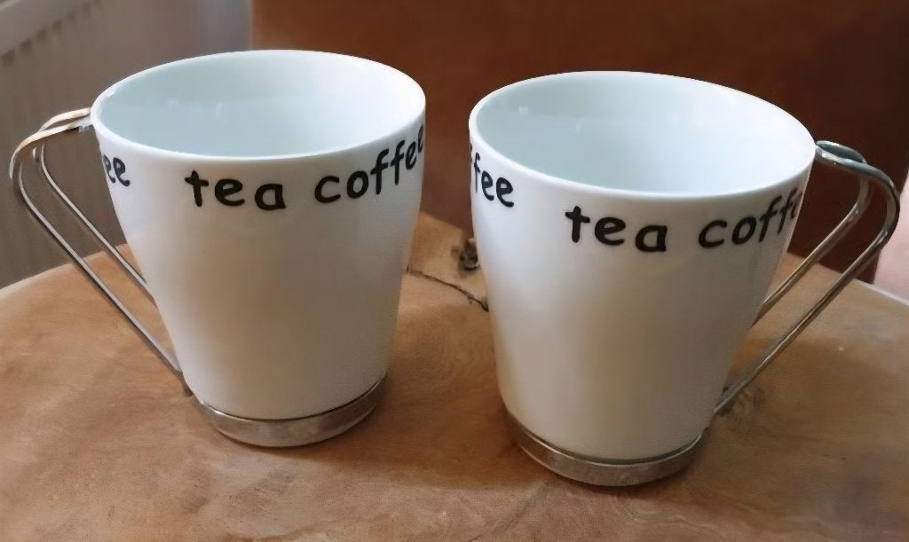 Tea coffee wit porselein bekers RVS greep 8.7cm mooi cadeau!, Huis en Inrichting, Overige merken, Nieuw, Ophalen of Verzenden
