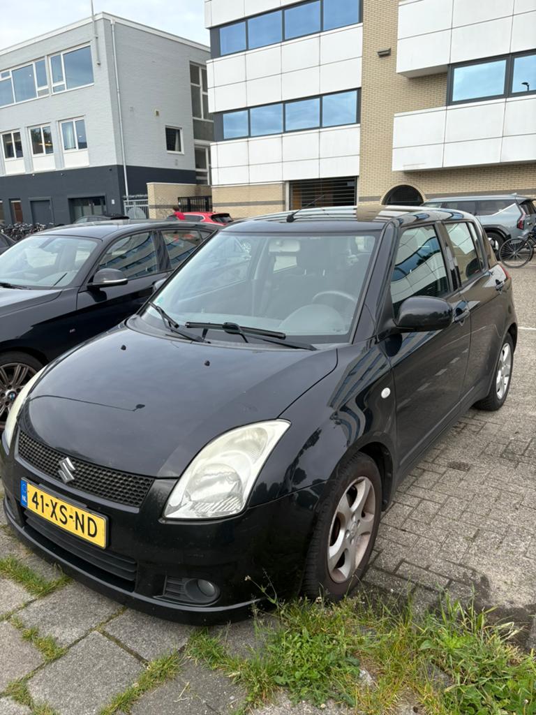 Suzuki Swift 1.5 5D 2007 Zwart, Auto's, Suzuki, Voorwielaandrijving, 15 km/l, 40 €/maand, 4 cilinders
