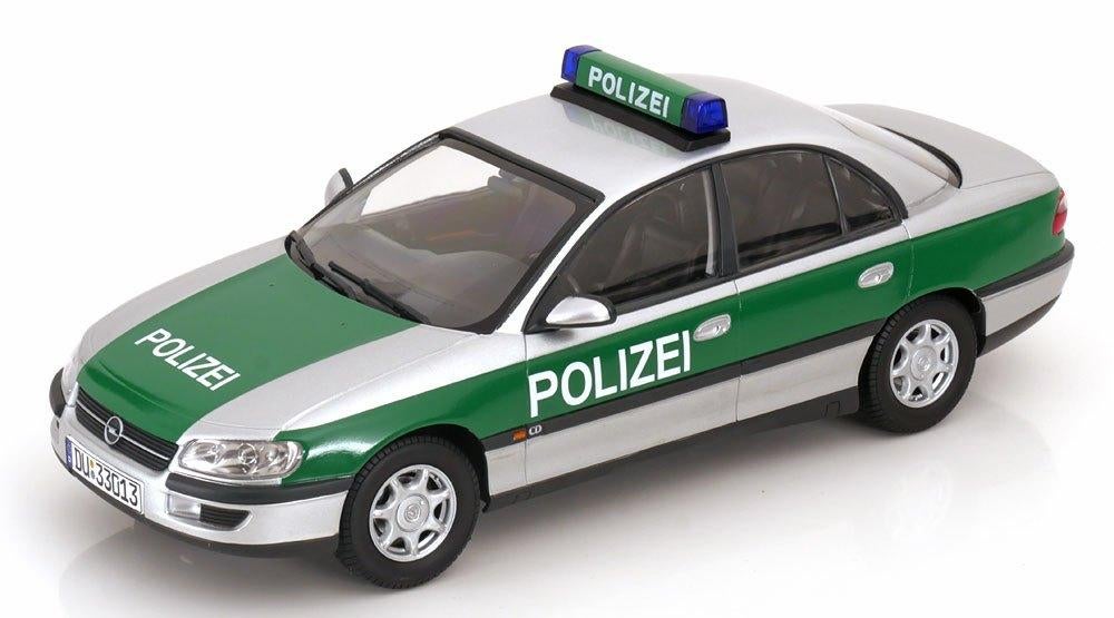 Opel Omega B 1996 “Polizei” Zilver / Groen 1-18 Triple 9 Col, Hobby en Vrije tijd, Modelauto's | 1:18, Overige merken, Tschuiten@hotmail.com