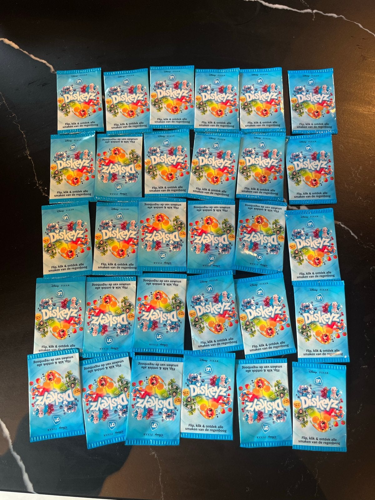 Disney Pixar AH Diskeyz - Complete set van 30 ongeopende zak, Verzamelen, Ophalen of Verzenden, Overige figuren, Nieuw, Overige typen