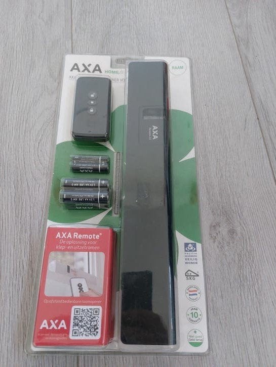 Nieuw! AXA Remote 2.0 Afstandsbedienbare Raamopener, Doe-het-zelf en Verbouw, Ophalen of Verzenden, Nieuw, Rvs, Slot