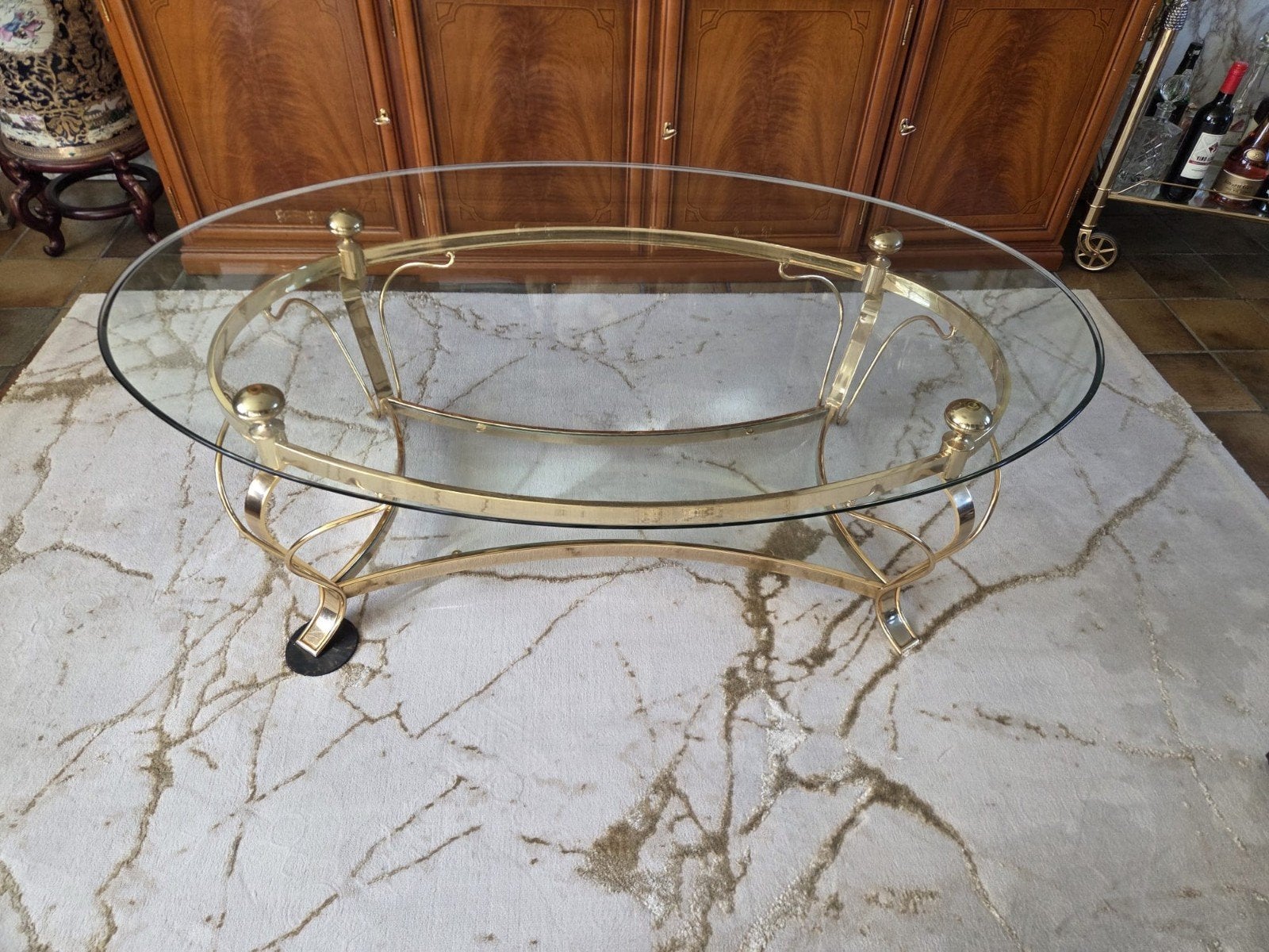 Zware ovale glazen salontafel met gouden metalen frame, Ophalen, Gebruikt, Glas, Ovaal