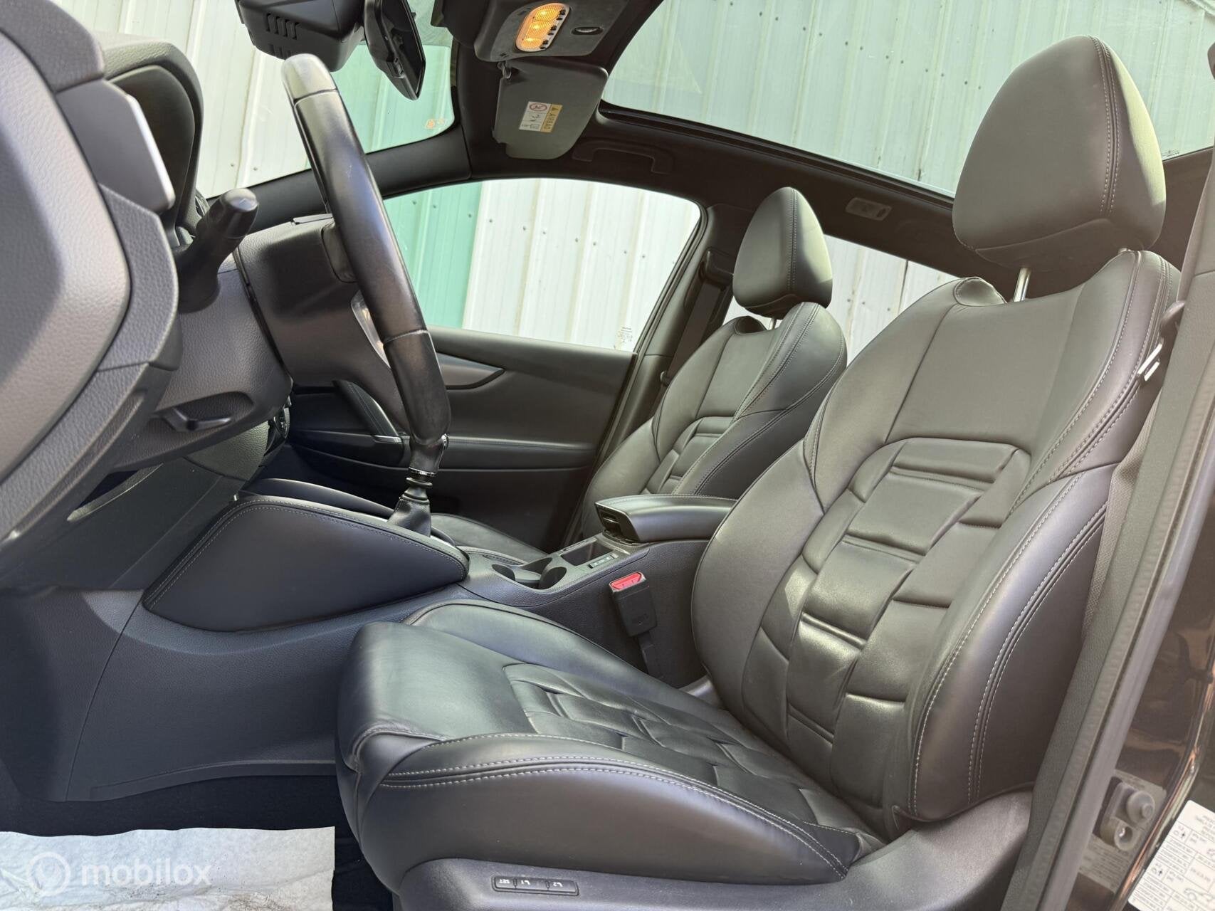 Nissan Qashqai 1.2 Tekna + | Pano | Bose | Leer | 360, Voorwielaandrijving, 4 cilinders, 116 pk, Zwart