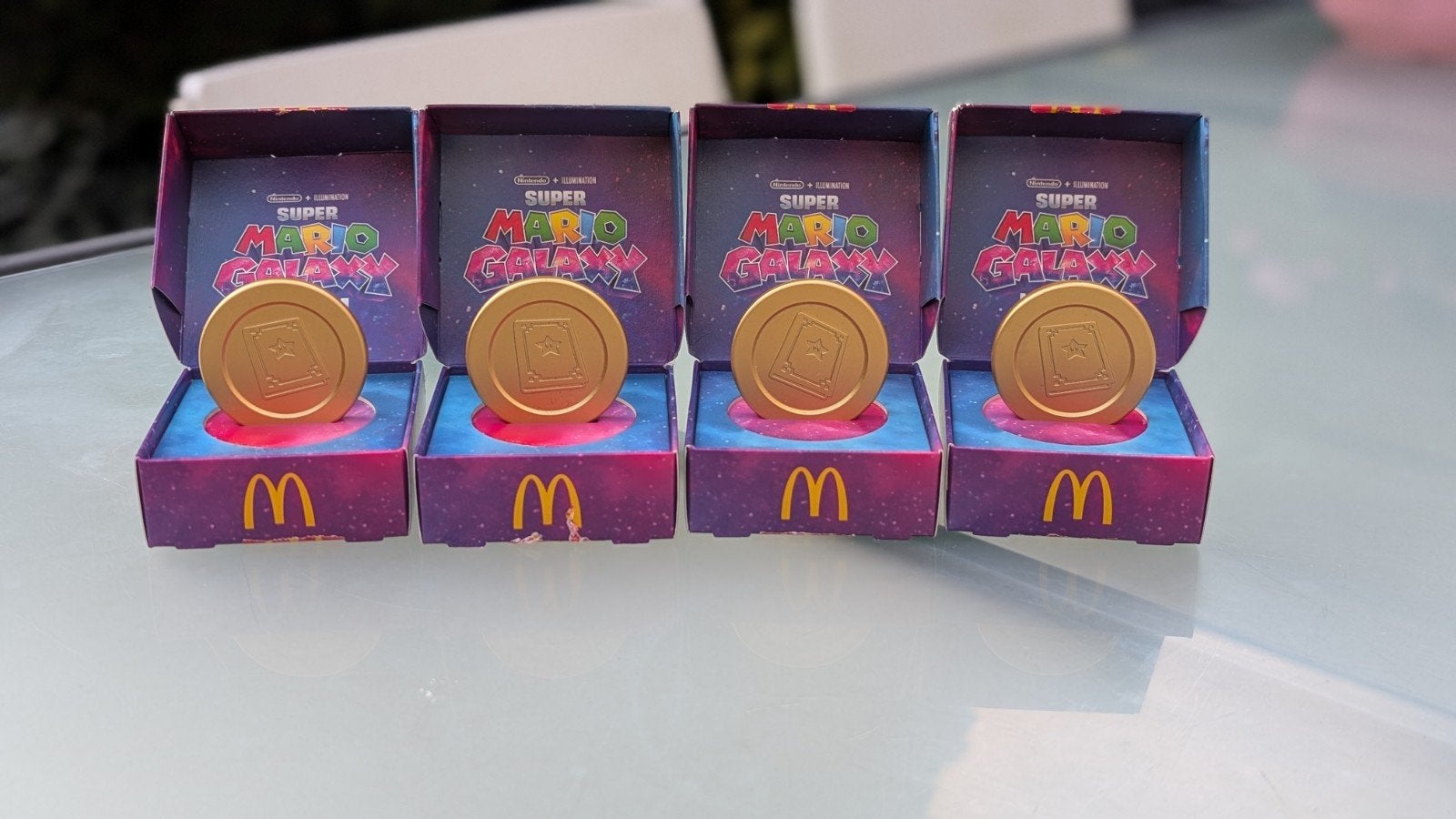 4x Super Mario Galaxy McDonald's munt Rosalina's Verhalen, Ophalen of Verzenden, Zo goed als nieuw