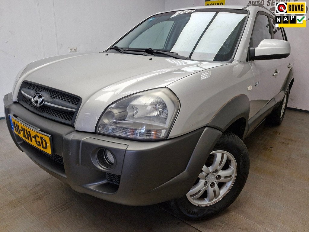 Hyundai Tucson 2.7i V6 4WD Style AUTOMAAT ! AIRCO ! NIEUWE A, Auto's, Hyundai, Automaat, Gebruikt, 2656 cc, Bedrijf