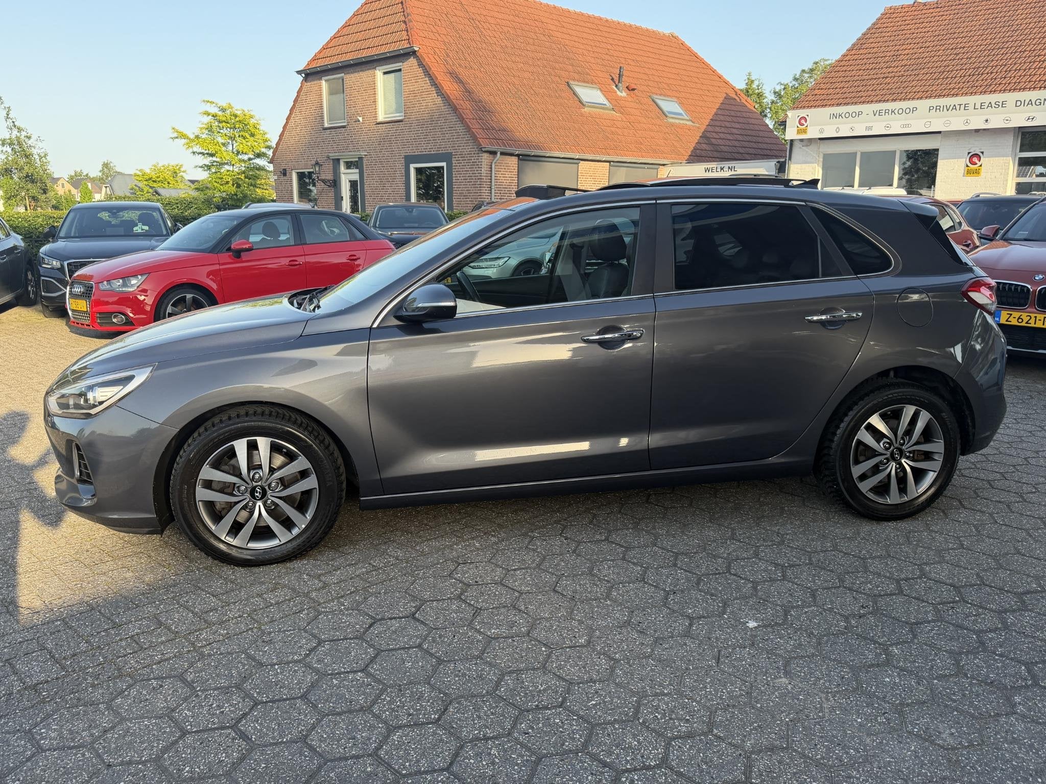 Hyundai i30 1.4 T-GDI Premium AUTOMAAT | PANO | LEER | KLIMA, Auto's, 12 maanden, Stof, Euro 6, 4 cilinders