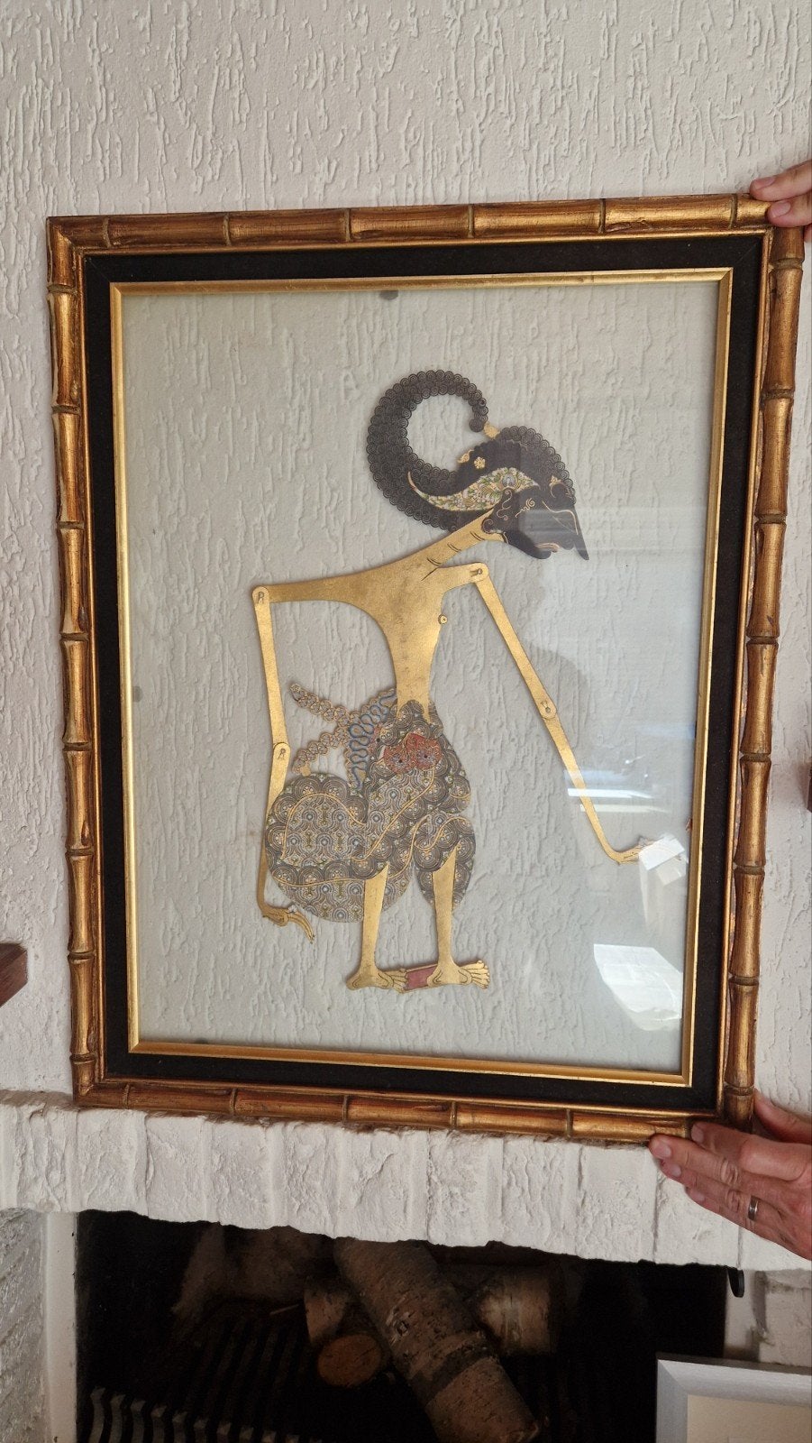 Wayang kulit ingelijst, Ophalen