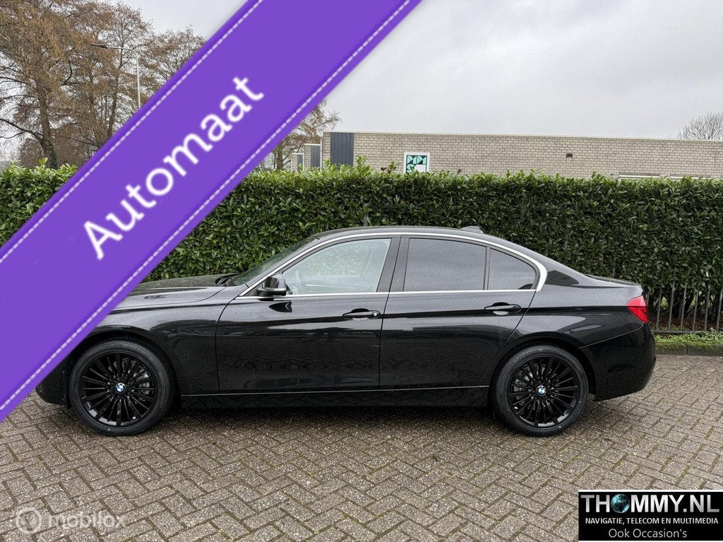 BMW 3-serie 318i Luxury Edition 2019, Auto's, Automaat, Gebruikt, Met garantie (alle), Zwart
