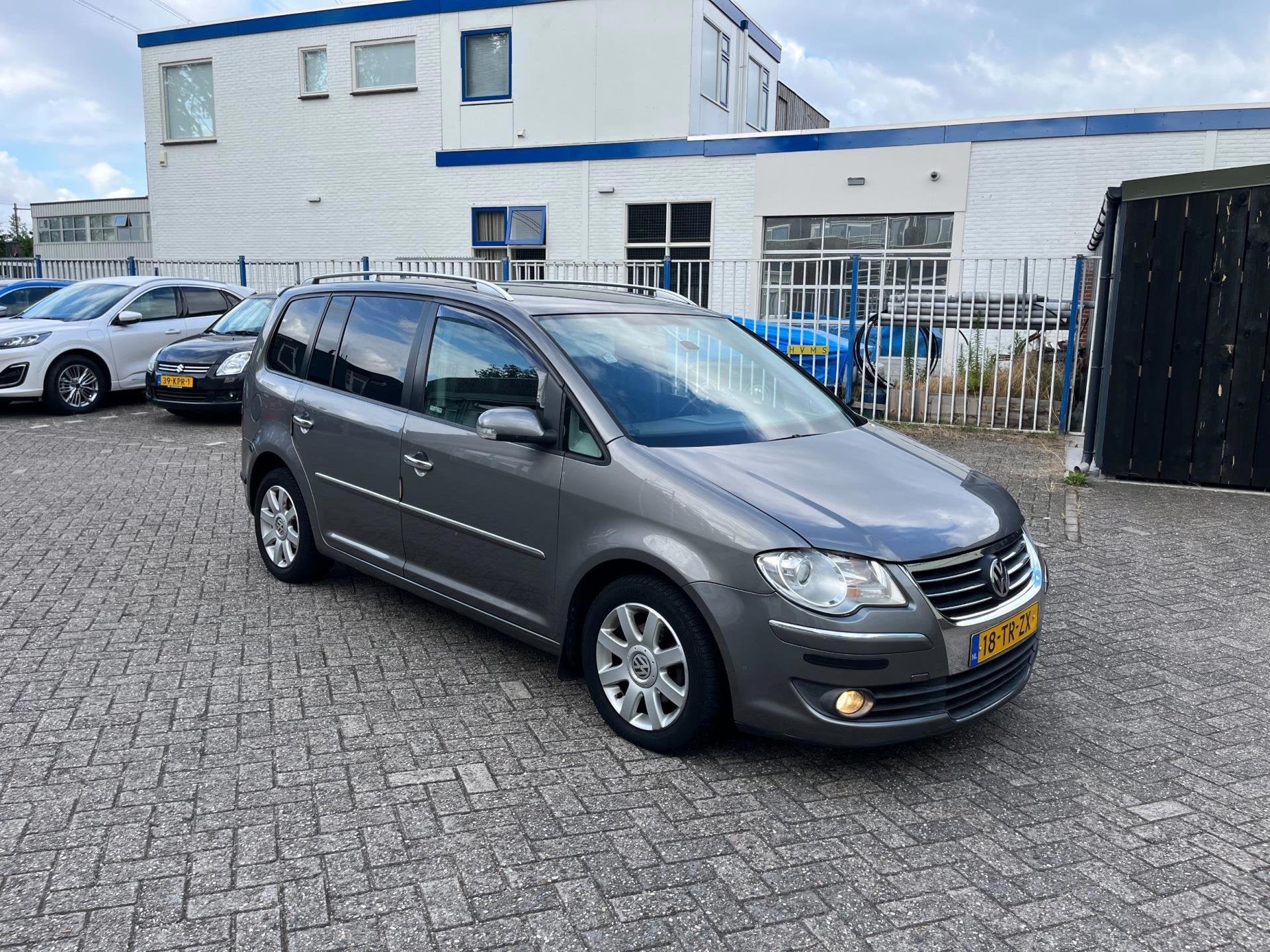 Volkswagen Touran 1.4 TSI Highline Business 7P, Auto's, Volkswagen, Voorwielaandrijving, Stof, 4 cilinders, Bedrijf