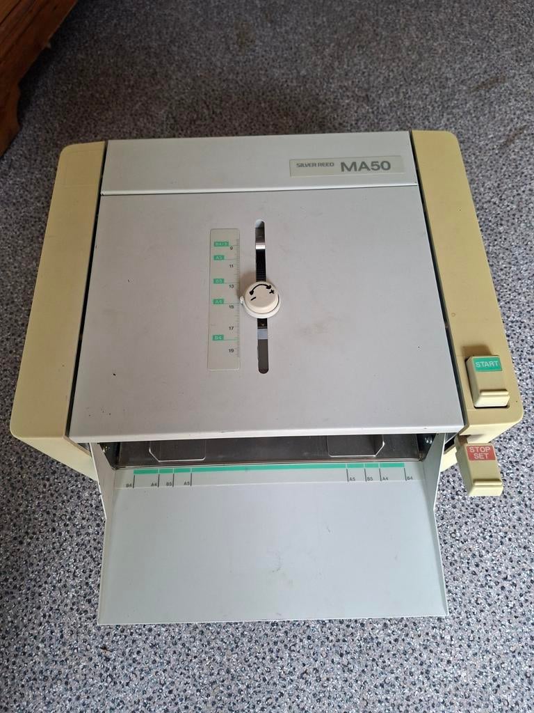 Vouwmachine, Ophalen