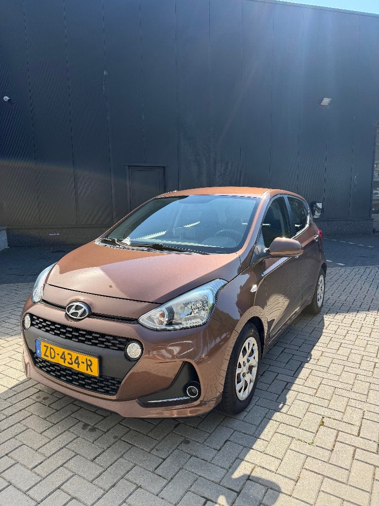Hyundai i10 1.0i (2019) | 94.666 km | APK tot feb 2028!, Voorwielaandrijving, Start-stop-systeem, Stof, Bruin