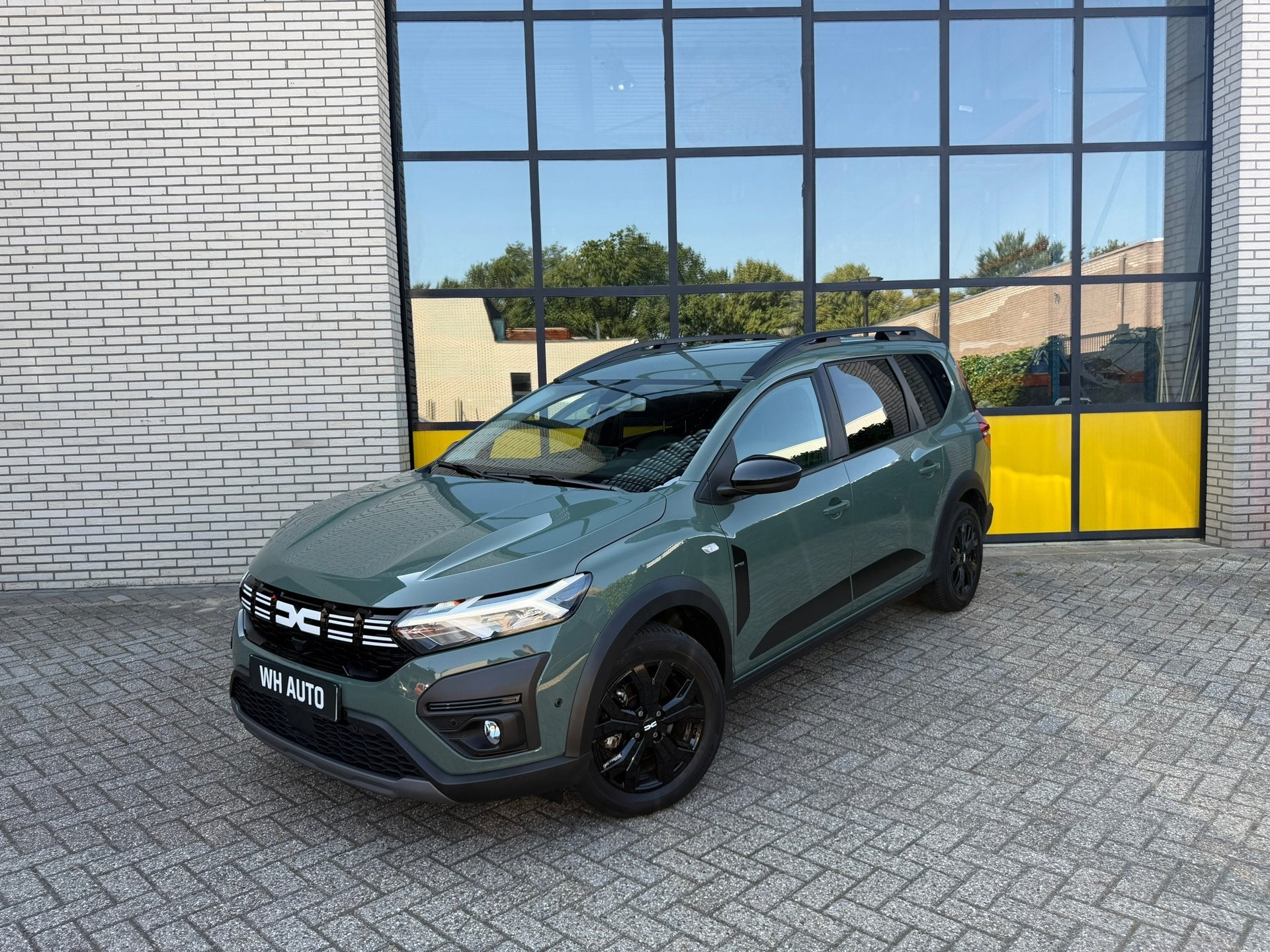 Dacia Jogger 1.6 Hybrid 140 Extreme 7p., Auto's, Dacia, Stof, 4 cilinders, 7 stoelen, Bedrijf