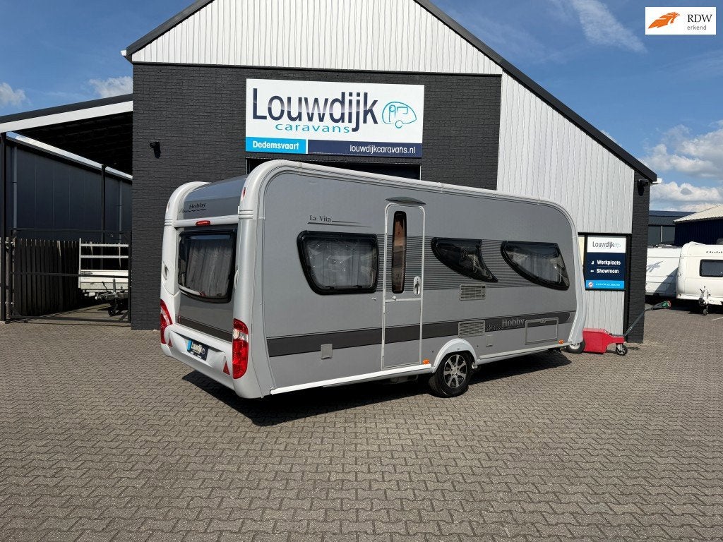 HOBBY La Vita 495 UL ’10 (Mover, Enkele Bedden), Rondzit, Hobby, 7 tot 8 meter, Bedrijf