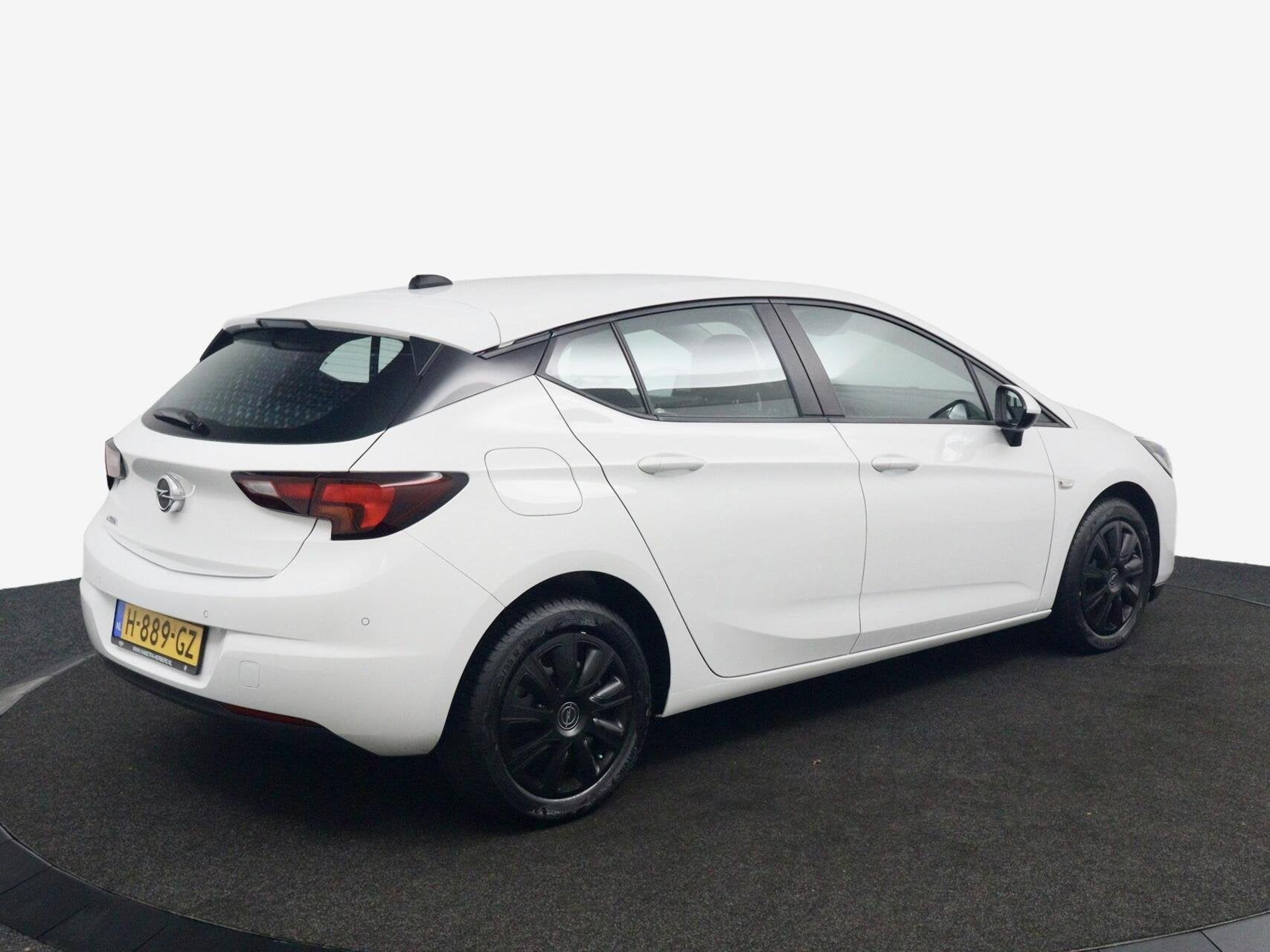 Opel Astra 1.2 Business Edition wit, Auto's, Gebruikt, Euro 6, 1199 cc, 620 kg