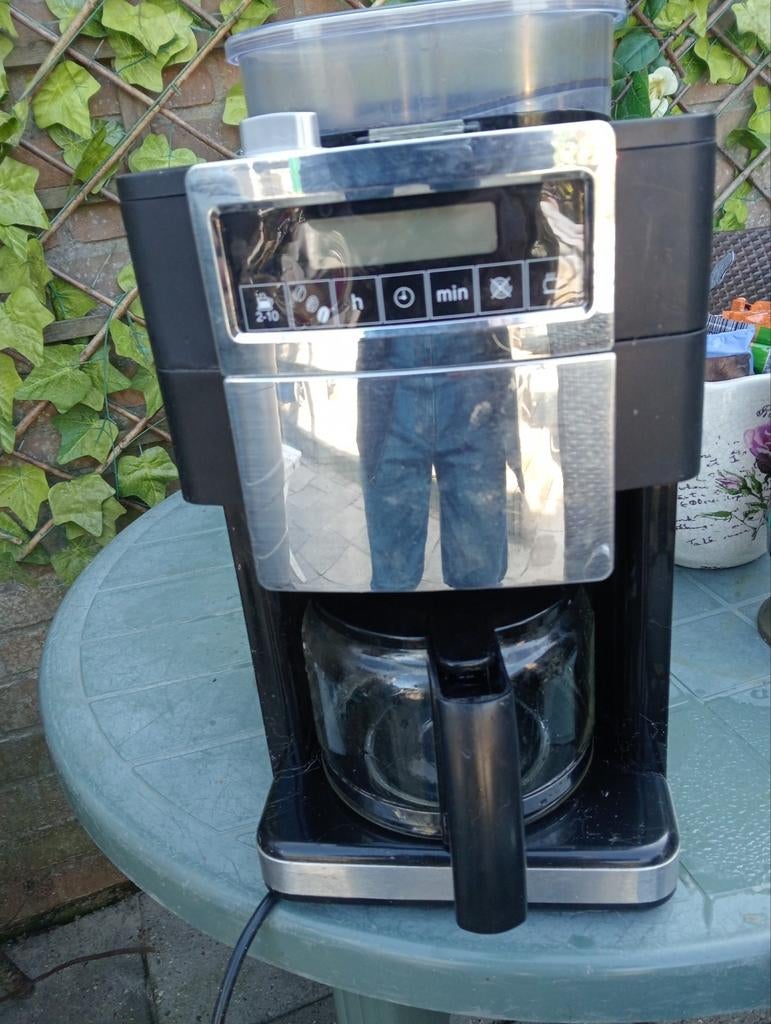 Koffiemachine voor koffiebonen, Ophalen