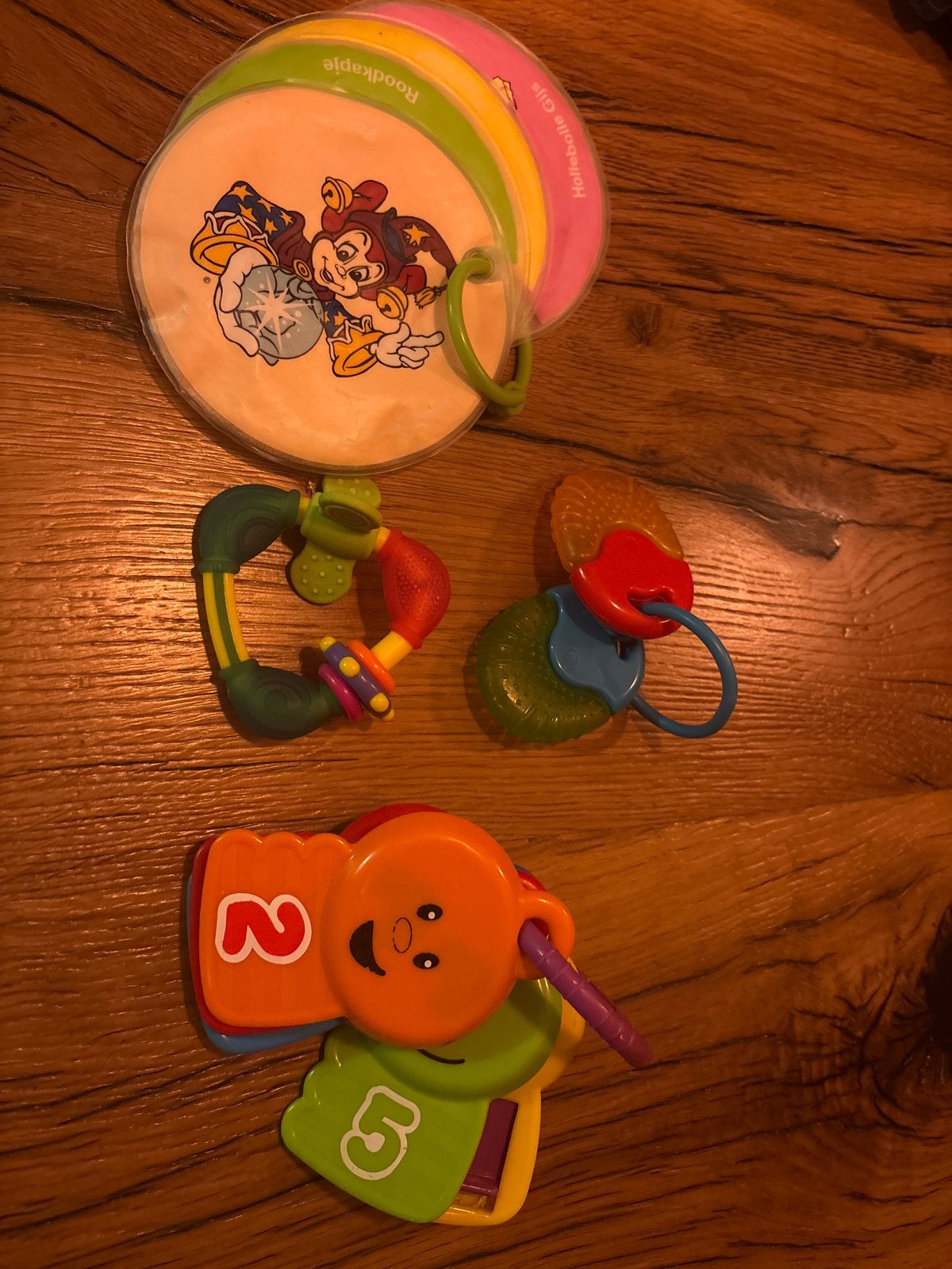 Baby speelgoed set: rammelaar, bijtring en boekje, Ophalen of Verzenden, Gebruikt, Rammelaar