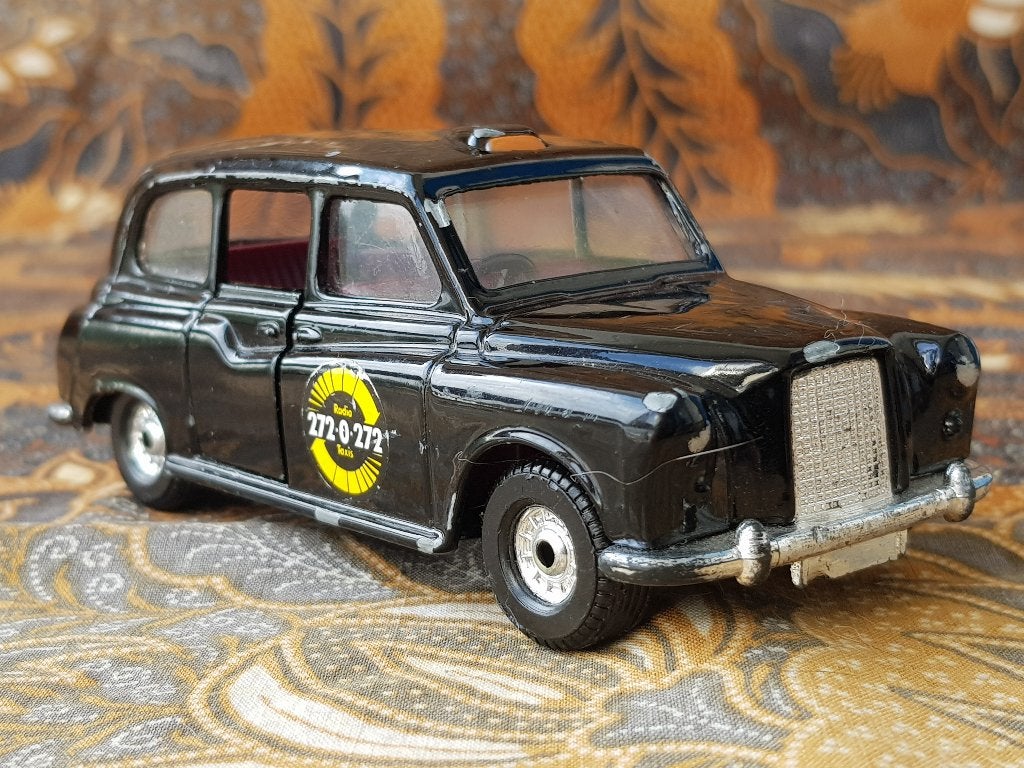 Mooie vintage model taxi van Corgi uit Engeland 12 cm., Antiek en Kunst, Antiek | Speelgoed, Ophalen of Verzenden