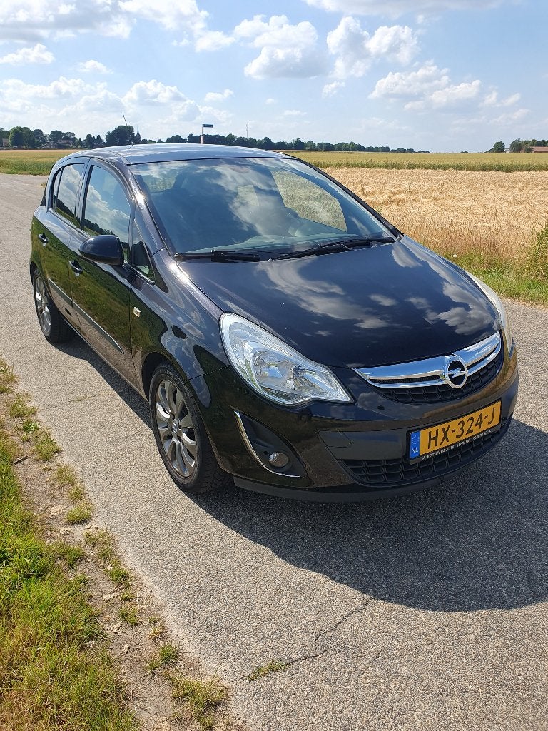 Opel Corsa 1.4 Ecotec 64KW 5D 2011 Zwart, Auto's, Voorwielaandrijving, 1063 kg, 1398 cc, 4 cilinders