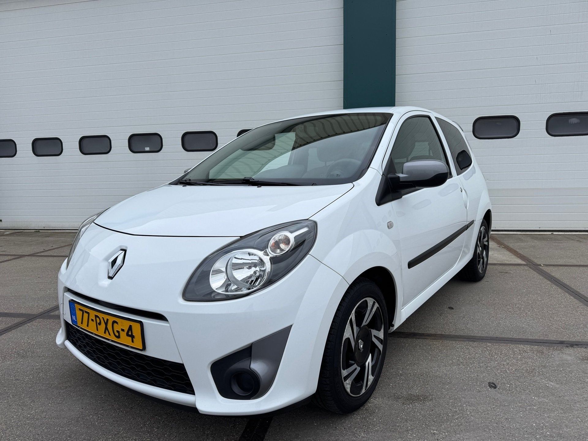 Renault Twingo 1.2-16V Collection, Auto's, Gebruikt, Zwart, 4 cilinders, 4 stoelen
