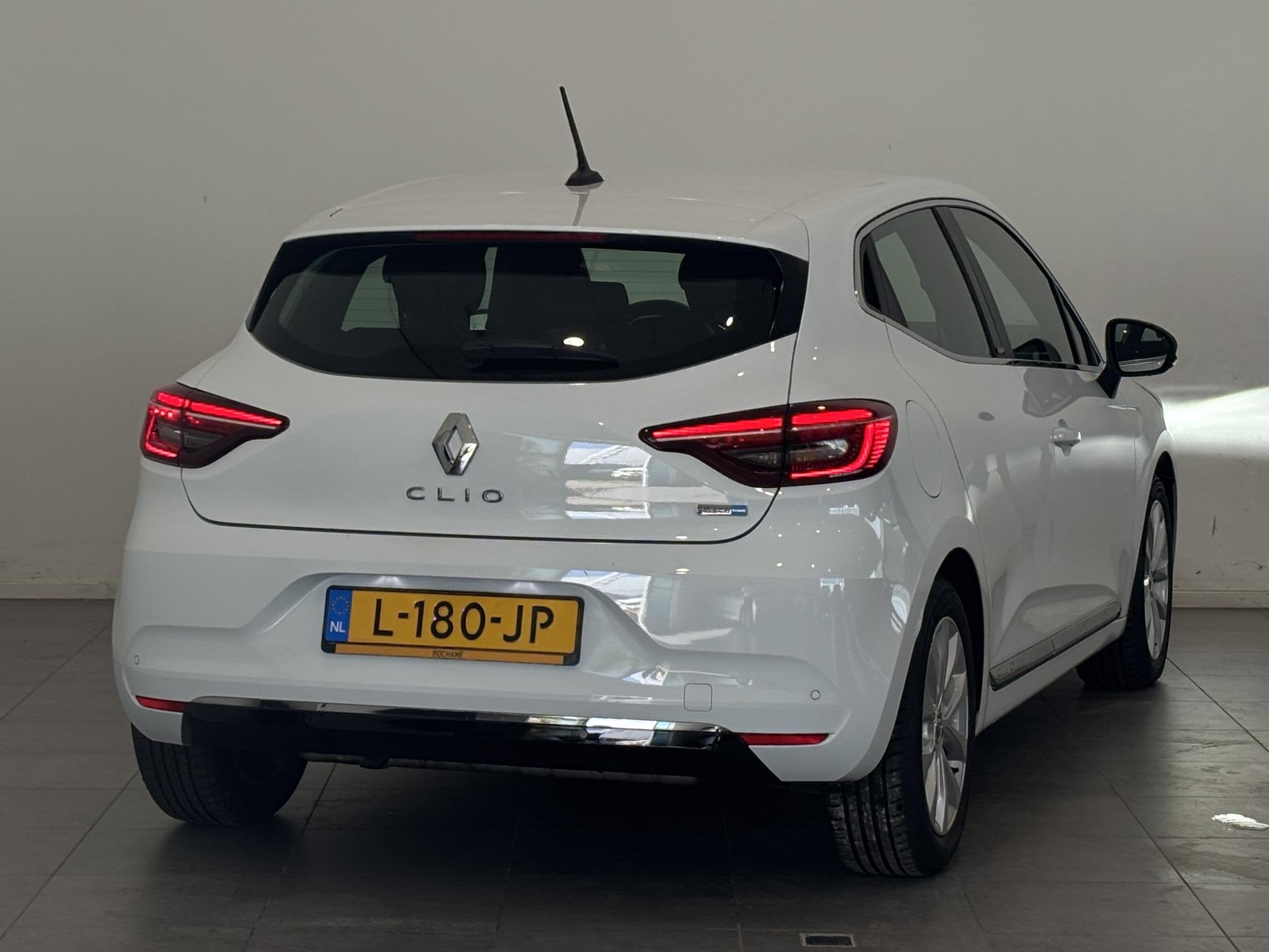 Renault Clio 1.6 E-Tech Hybrid 140 Intens | Climate Control, Auto's, Gebruikt, 4 cilinders, Met garantie (alle), Wit