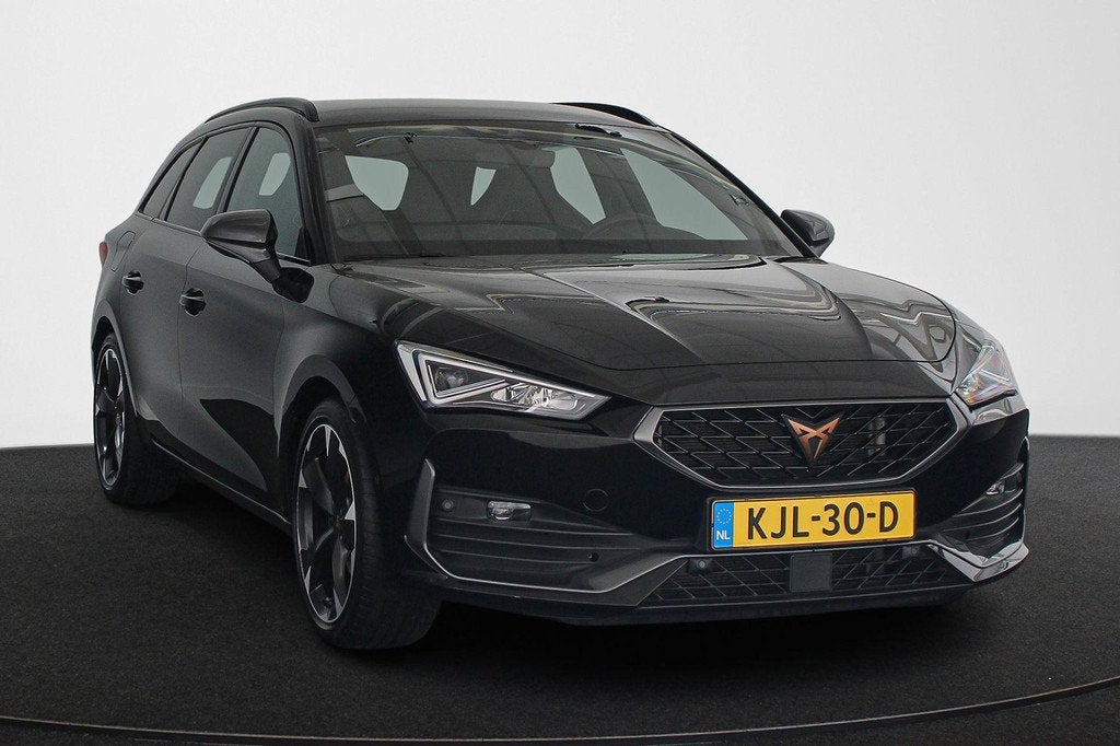 CUPRA Leon Sportstourer 1.4 e-Hybrid Business Stuur-Stoelver, Auto's, Cupra, Stof, Gebruikt, 4 cilinders, 1589 kg
