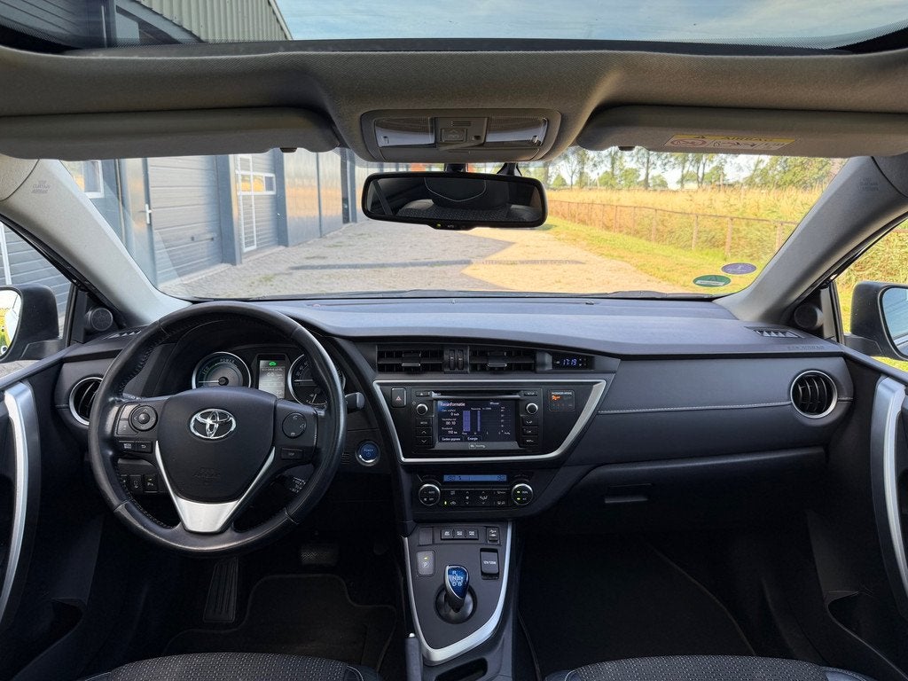 Toyota Auris Touring Sports 1.8 Hybrid Executive, Auto's, Toyota, Euro 5, Gebruikt, Automatische klimaatregeling, Leder en Stof