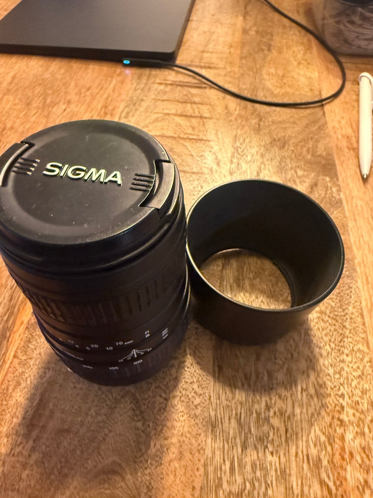 Sigma lens  100-300 met zonnekap €30, Ophalen, Zo goed als nieuw, Telelens
