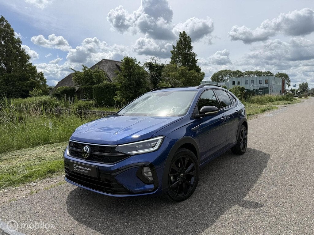 Volkswagen Taigo 1.0 TSI R-Line Business / CarPlay / Camera, Automatische klimaatregeling, Gebruikt, Zwart, Blauw