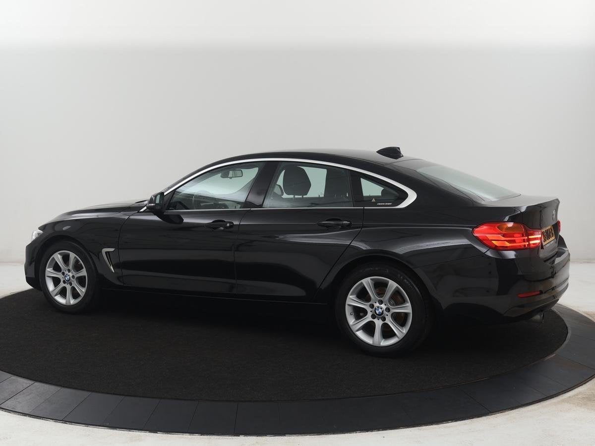 BMW 4-serie Gran Coupé 418i Centennial Executive | M-interi, Auto's, Gebruikt, Euro 6, Zwart, Handgeschakeld