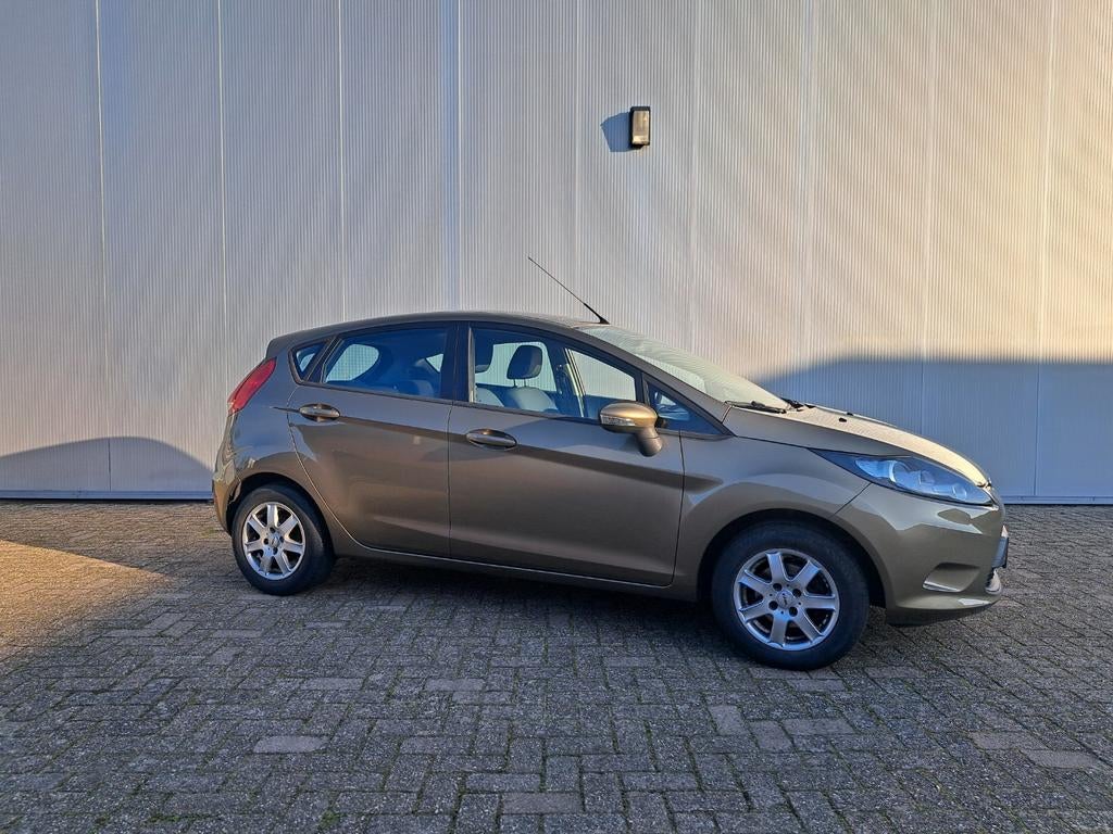 Ford Fiësta 1.25 Ghia 5DR 2012 Nette auto!!, Voorwielaandrijving, Stof, 40 €/maand, 4 cilinders