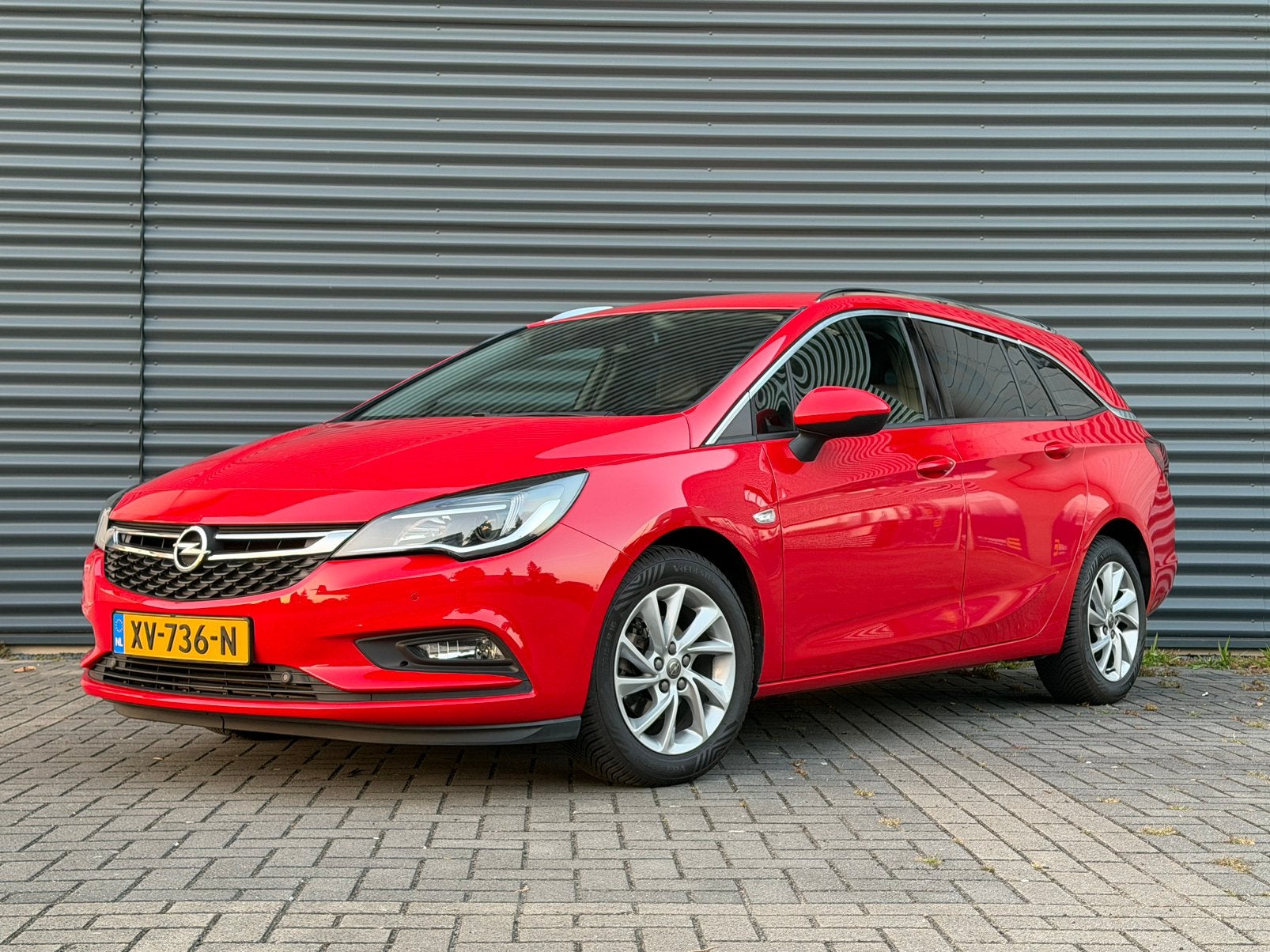 Opel Astra 1.0 T | Als Nieuw! | Trekhaak | AGR | winterpack, Auto's, Voorwielaandrijving, 620 kg, Origineel Nederlands, Stationwagon