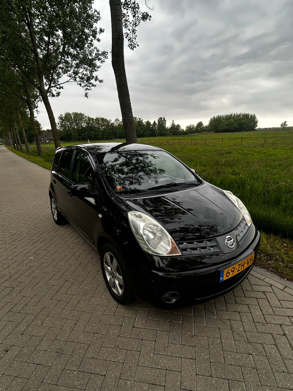 Nissan Note 1.4 16V 2008 Zwart , Airco, Nieuw apk, Auto's, Nissan, Voorwielaandrijving, 40 €/maand, 4 cilinders, Zwart