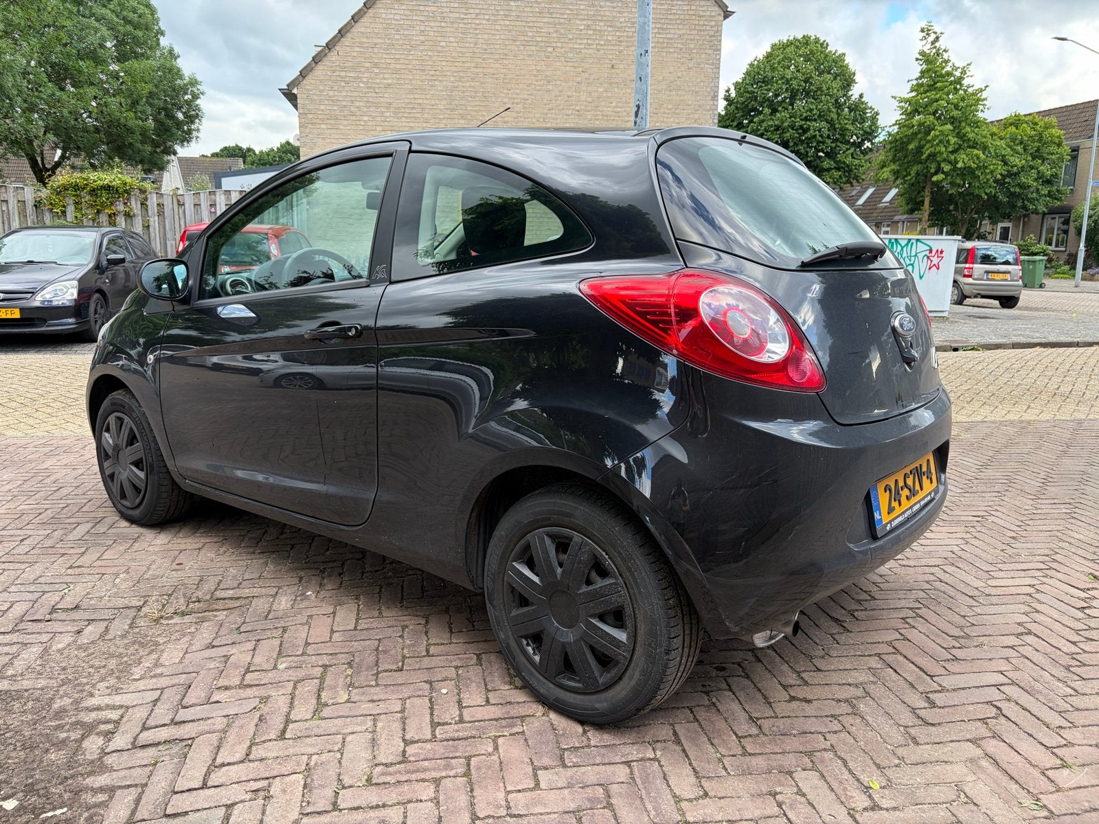 Ford Ka 1.2 69pk 2012 Zwart, Auto's, Voorwielaandrijving, 1242 cc, 4 cilinders, 4 stoelen