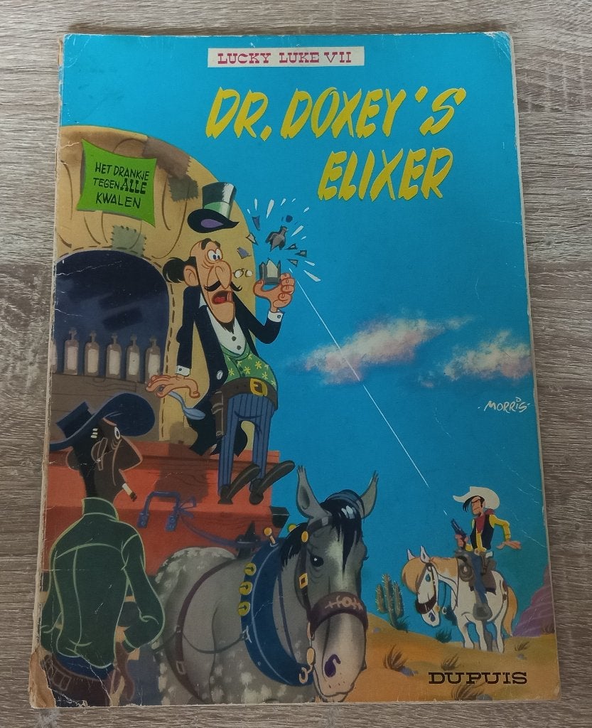 Lucky Luke Dr. Doxey's elixer (Dupuis 7, 1971), Gelezen, Eén stripboek, Ophalen of Verzenden, Morris