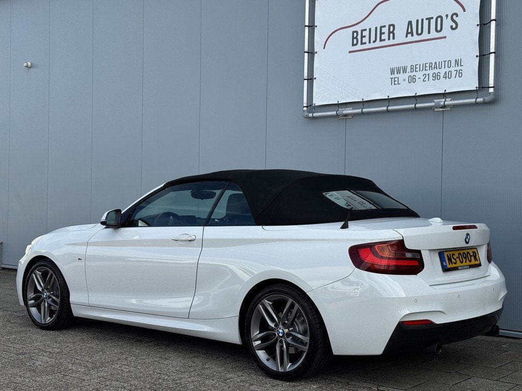 BMW 2 Serie Cabrio 218i High Executive Automaat van €23.49, Auto's, BMW, Automaat, Gebruikt, Cabriolet, 4 stoelen