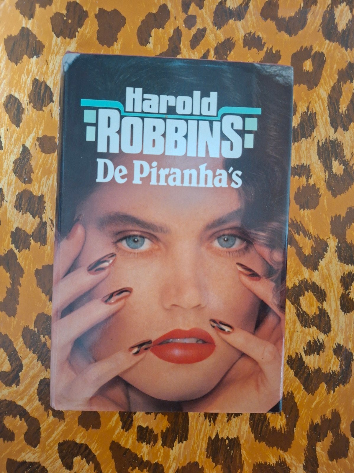 Harold Robbins - De Piranha's, Ophalen of Verzenden, Gelezen, Harold Robbins, Nederland