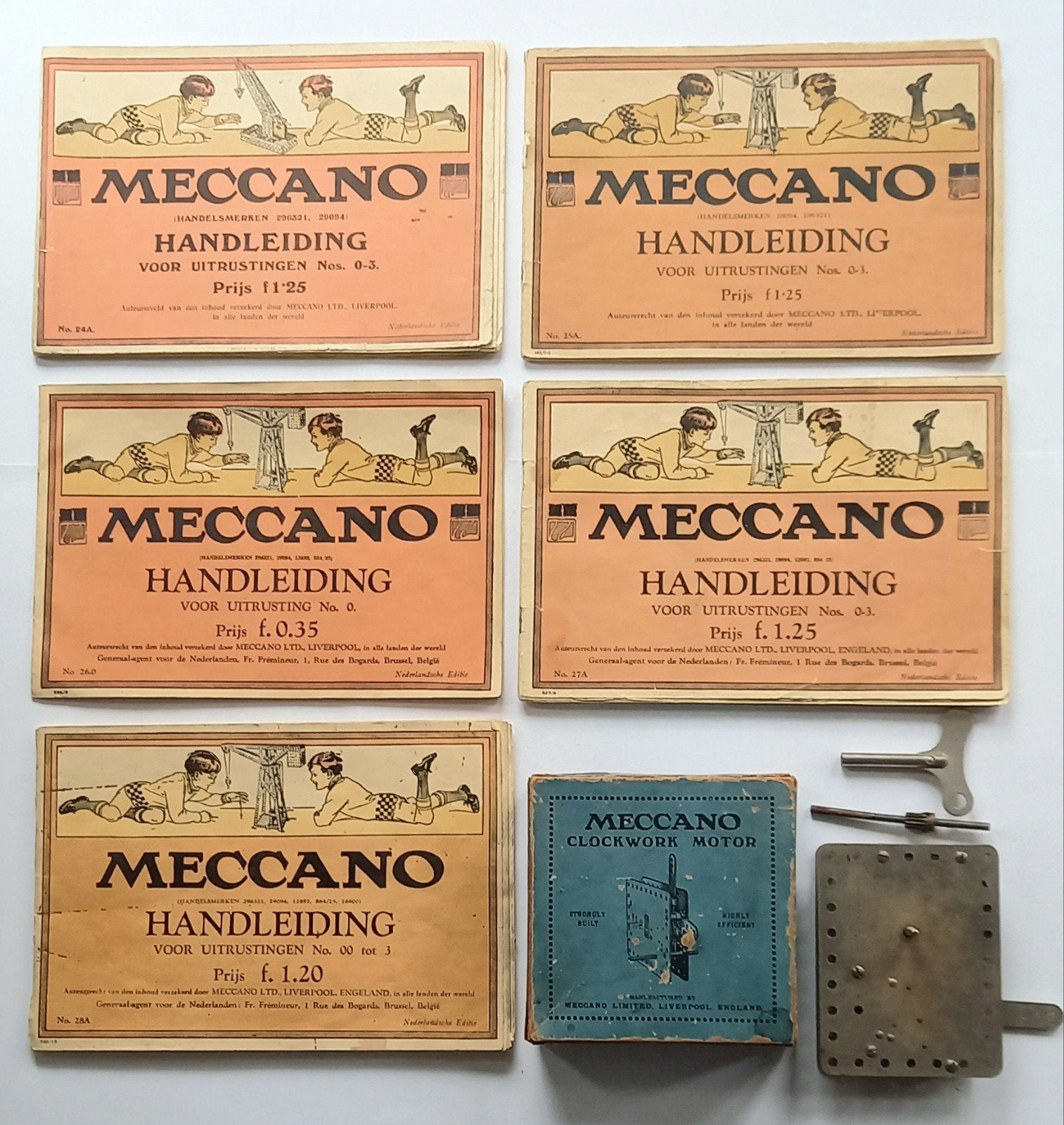 Meccano Clockwork Motor met sleutel en 5 handleidingen, Ophalen of Verzenden, Gebruikt