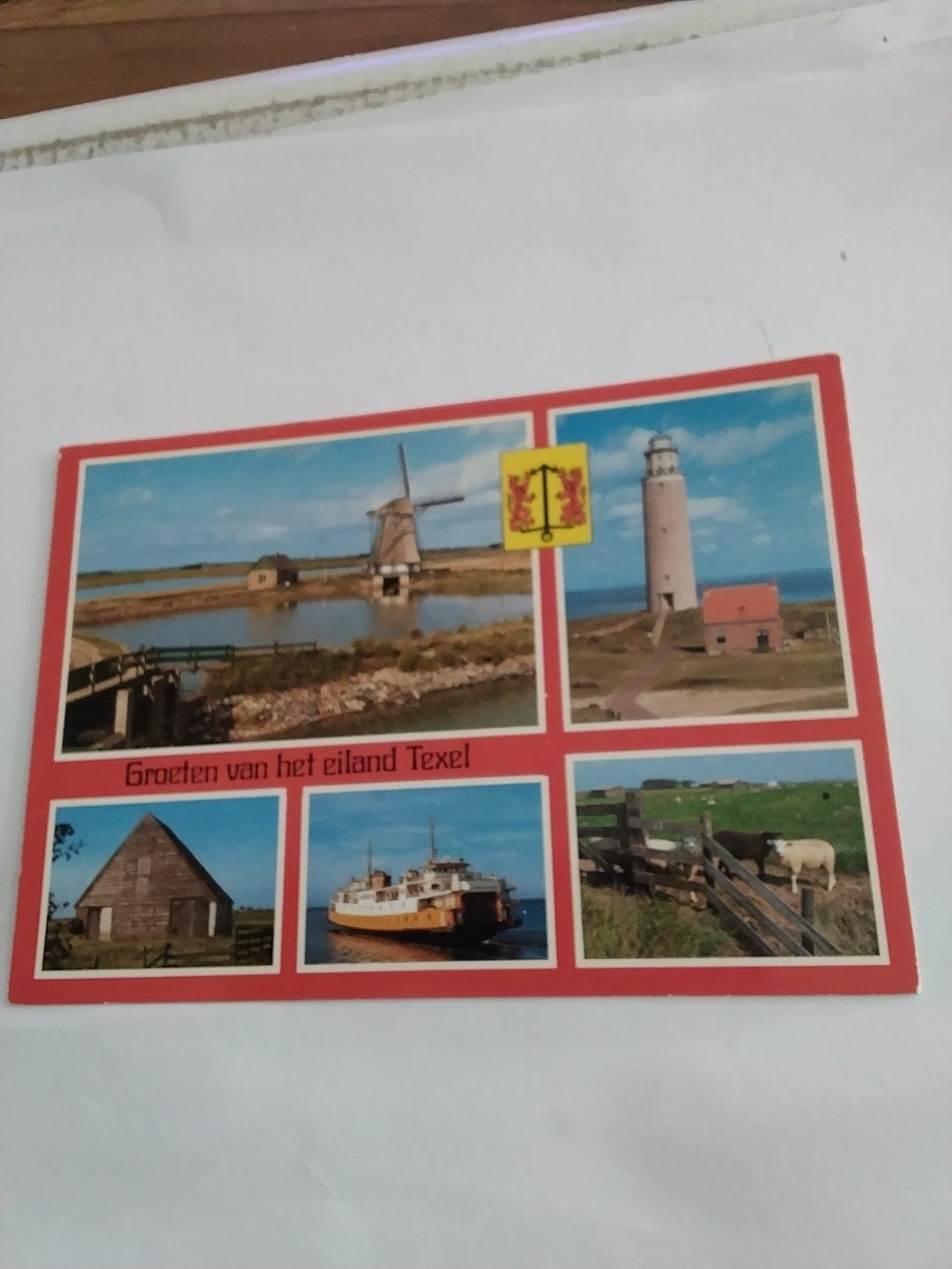 Oude ansichtkaart Texel - Molen, vuurtoren, schapen, boot, Ophalen of Verzenden