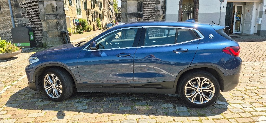 BMW X2 Sdrive18i 136pk Aut, nov. 2020, Slechts 61.800 km, Auto's, Blauw, Parkeerassistent, 75 €/maand, Grijs