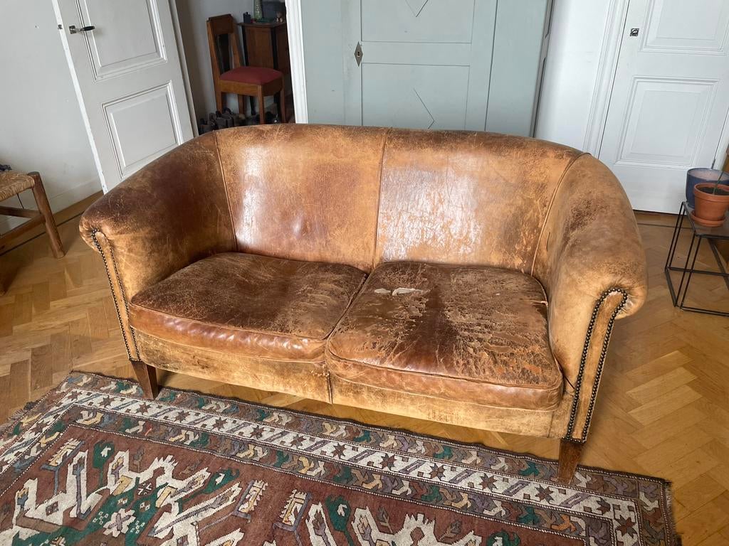 Mooie maar kapotte schapenleren bank, Huis en Inrichting, Gebruikt, Vintage, Tweepersoons, Ophalen of Verzenden