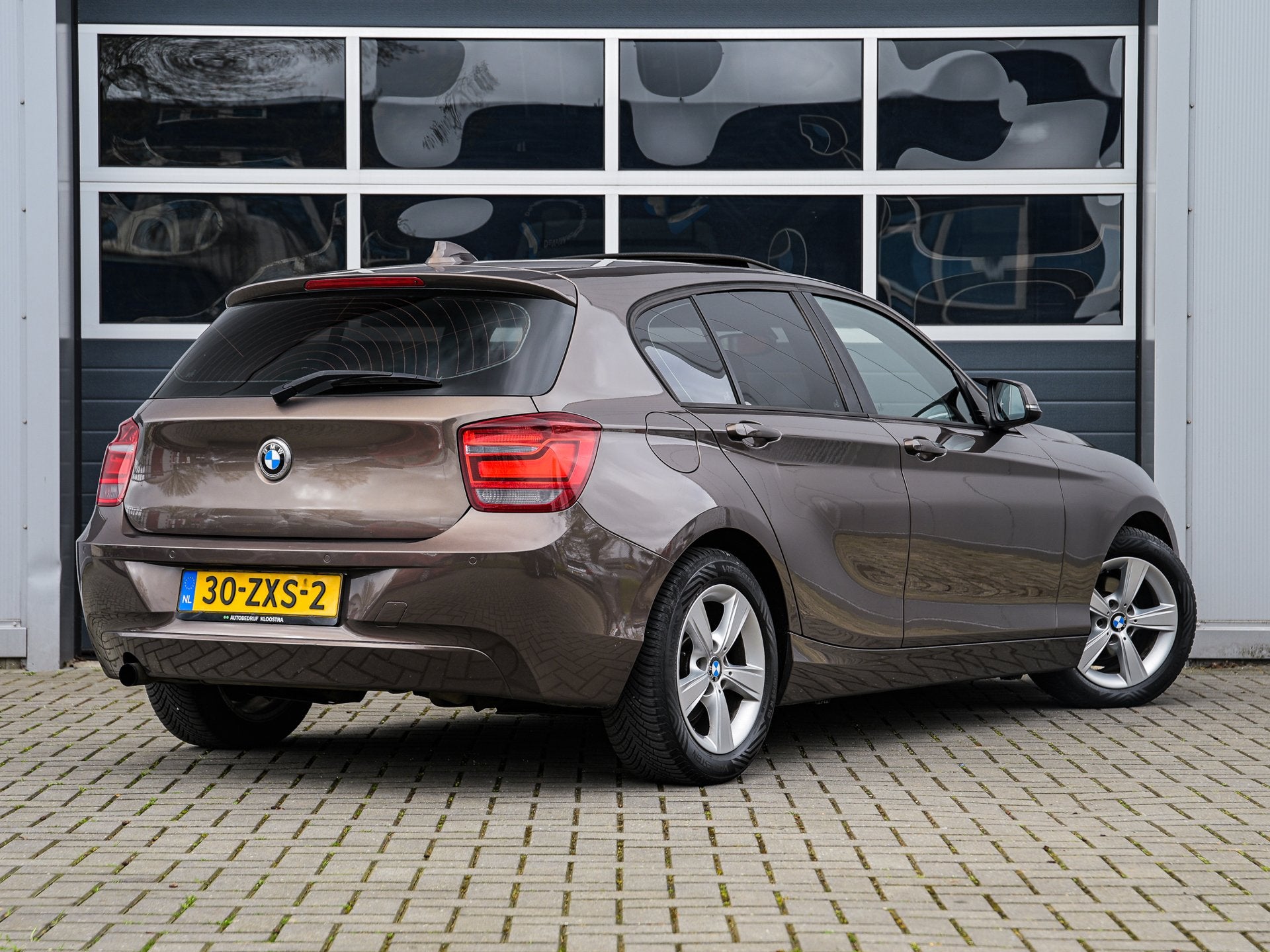 BMW 1-serie 114i Upgrade Edition | Leder | Schuifdak | Xenon, 1-Serie, Euro 5, Achterwielaandrijving, Gebruikt