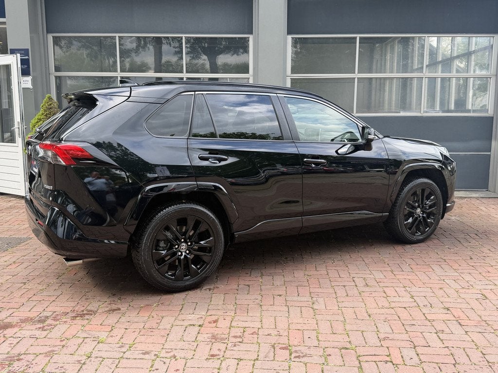 Toyota RAV4 2.5 Hybrid AWD Black Edition | ex BPM | LED | Na, Auto's, Toyota, Automaat, Gebruikt, Zwart, 4 cilinders