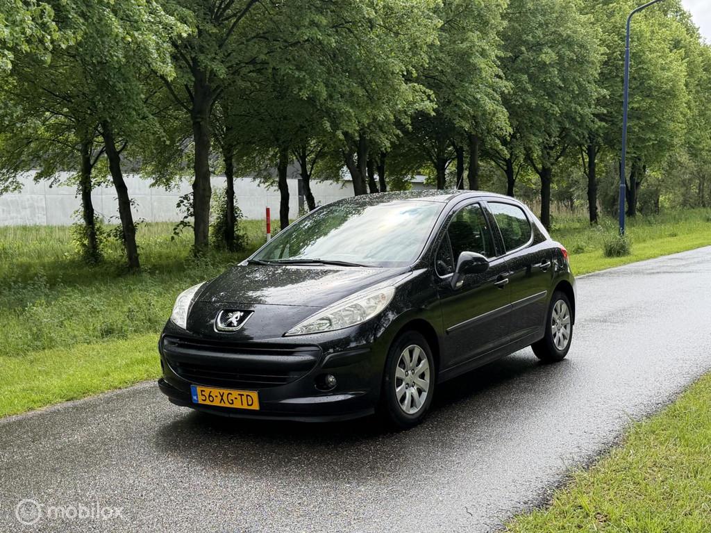 Peugeot 207 1.4 Color-line*1E EIGENAAR*NEW APK*AIRCO*TREKHAA, Auto's, Voorwielaandrijving, Stof, Zwart, 4 cilinders