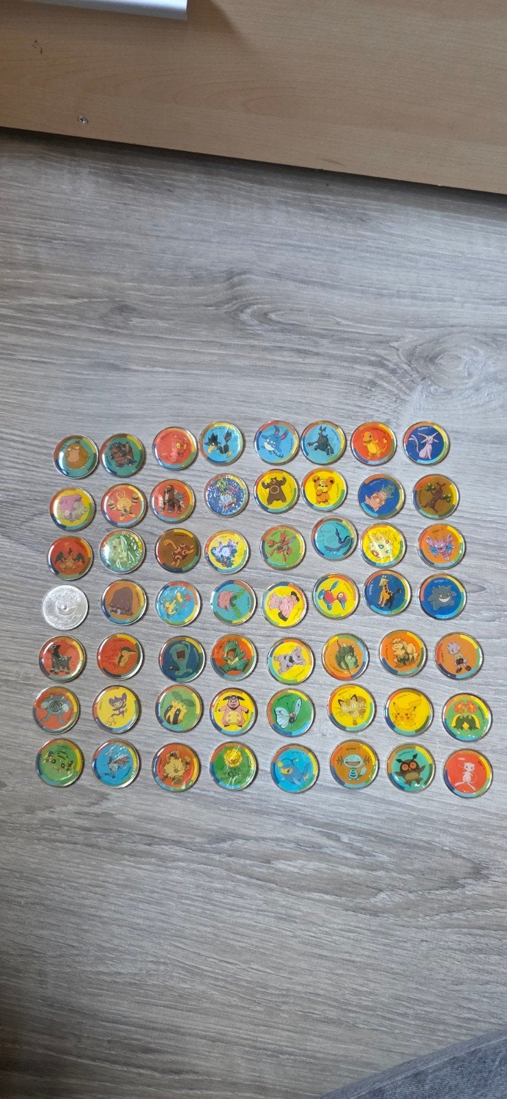 Pokemon munten uit 2001 - 64 stuks, Ophalen of Verzenden, Overige typen