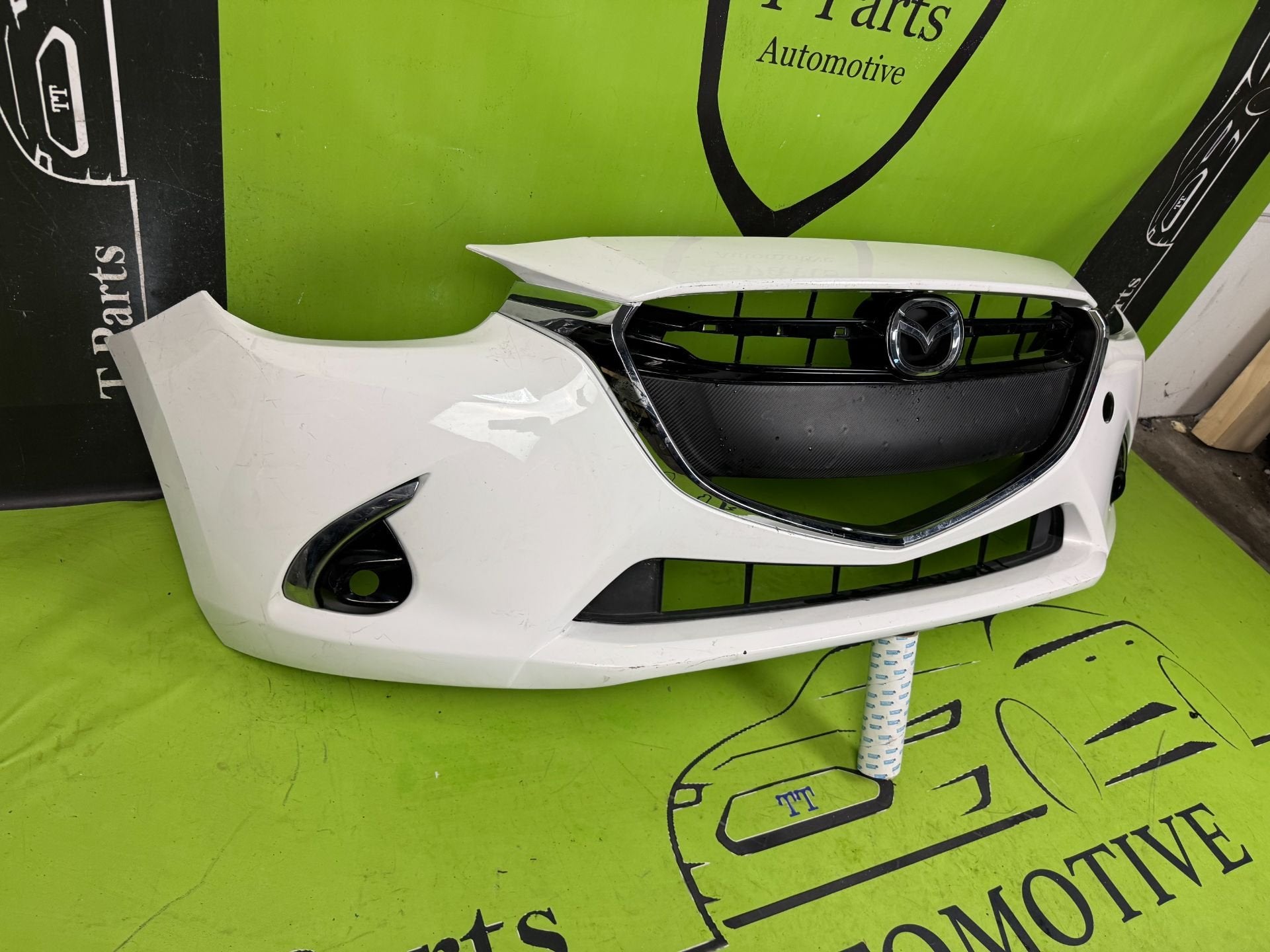 mazda 2 voorbumper bumper, Gebruikt, Shinchi, Fuchu-Cho 3-1
730-8670  Hiroshima, Mazda Motor Corporation, Info@mazda.co.jp