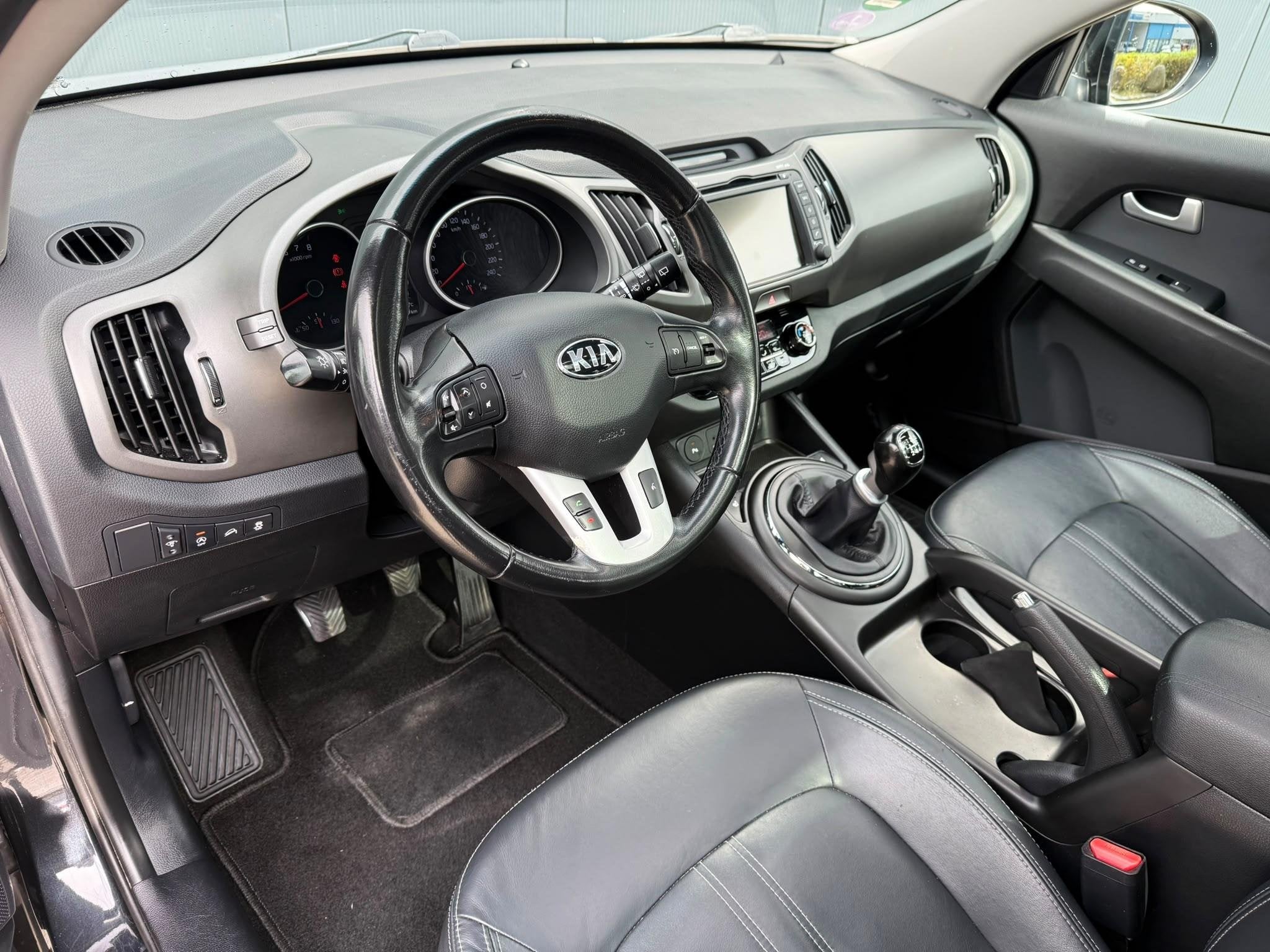 Kia Sportage 1.6 GDI ExecutiveLine pano leder camera, Auto's, Voorwielaandrijving, 135 pk, 4 cilinders, Zwart