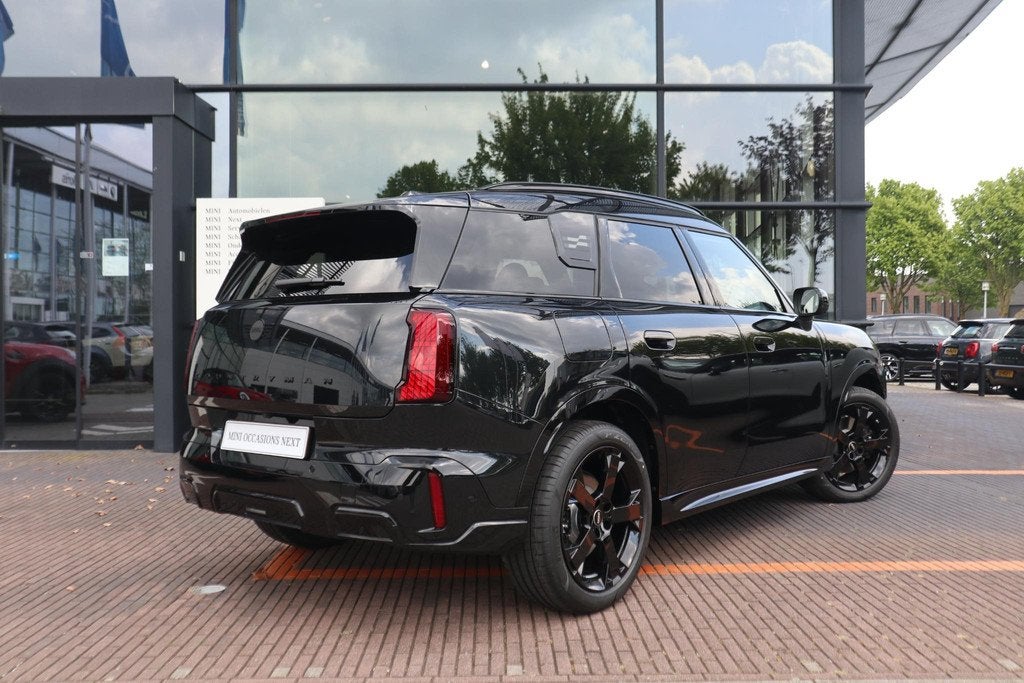 MINI Countryman C | John Cooper Works Trim + Pakket L, Met garantie (alle), Leder en Stof, Zwart, Origineel Nederlands