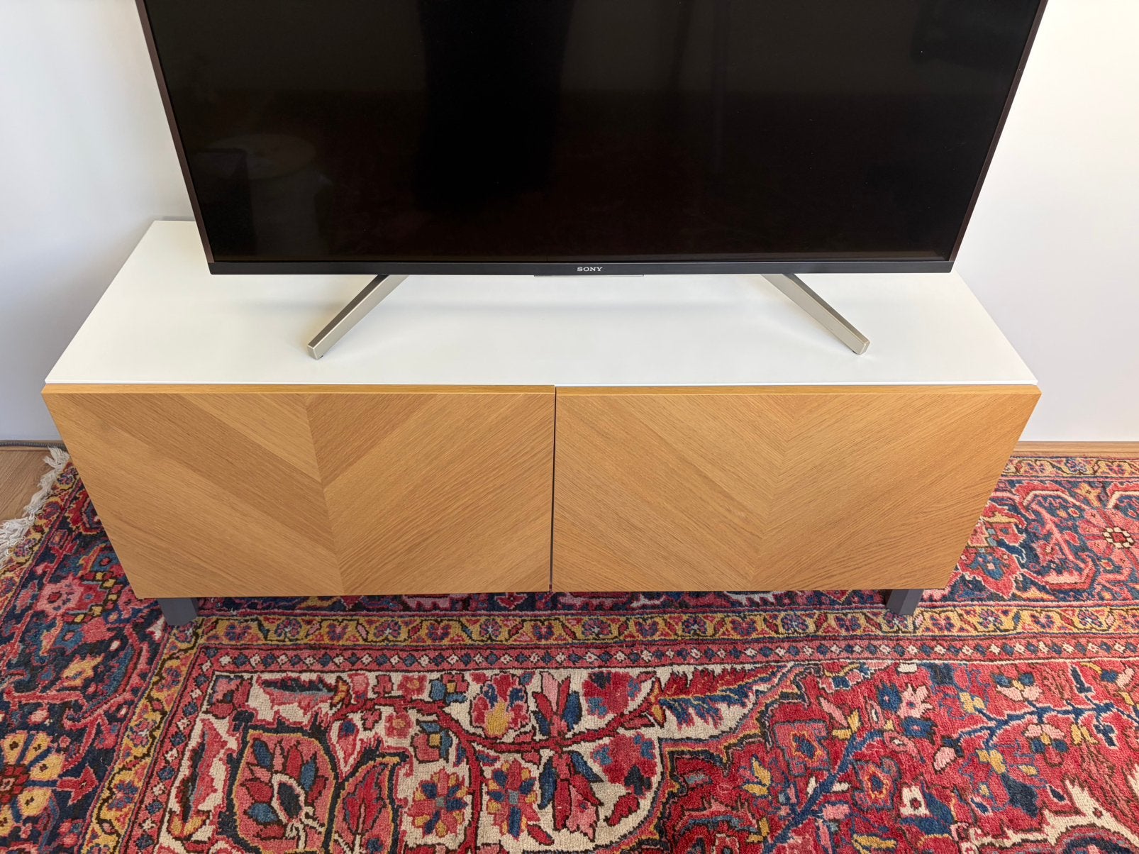 Ikea Besta tv-meubel 120cm breed wit/eiken en grijze poten, Ophalen, 100 tot 150 cm, Zo goed als nieuw, Minder dan 100 cm